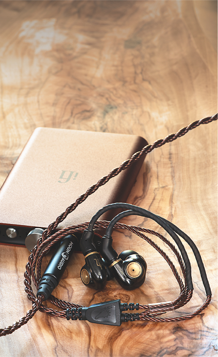 DAP on desk with earbuds cables attached - Moon Audio